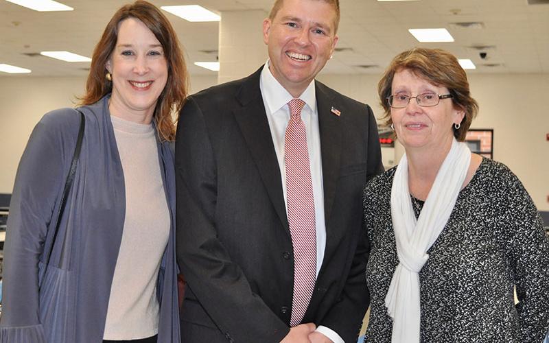 Manda Gwatney, from left, and School Superintendent Dr. Michael Gwatney were among the co-workers and friends who helped Theresa “T.C.” Dillard celebrate her retirement at a December 12 reception.
