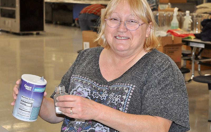 Good Samaritans of Fannin County volunteer Charlotte Gillespie helped prepare for the organization’s Community Thanksgiving Open Table event by filling salt shakers Wednesday, November 27.