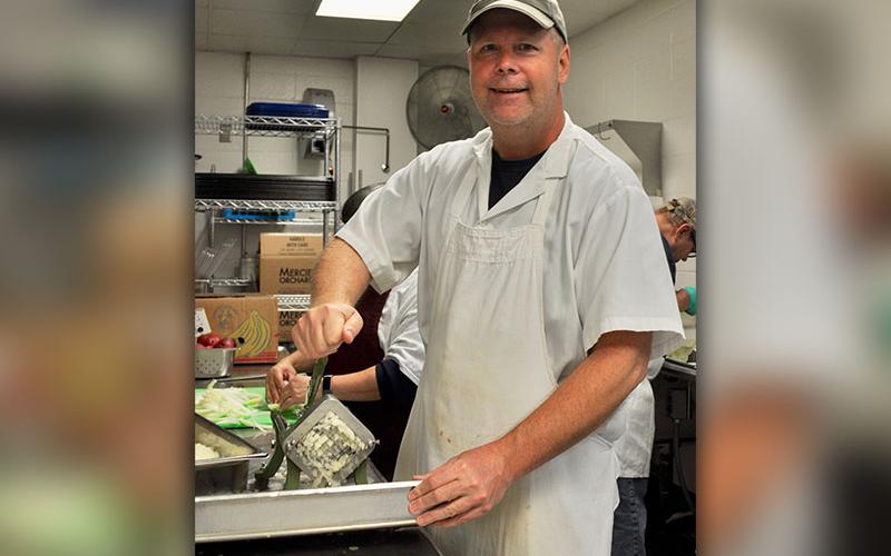 Luke McDonald volunteered with The Good Samaritans of Fannin County Wednesday, November 27 and helped prepare food for their Community Thanksgiving Open Table event.