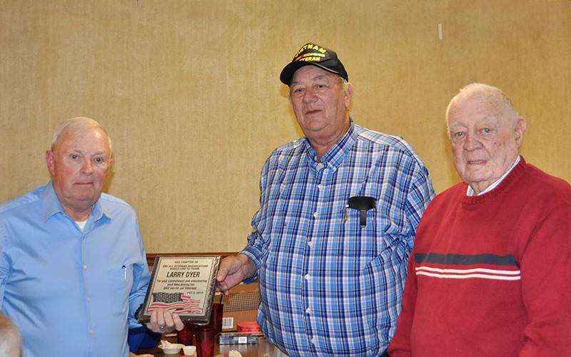 Larry Dyer, left, was honored at the Fannin County veterans organizations’ Christmas dinner Thursday, December 5 for volunteering his time to drive the Disabled American Vets van for community veterans. He is shown with Paul Hunter, right.