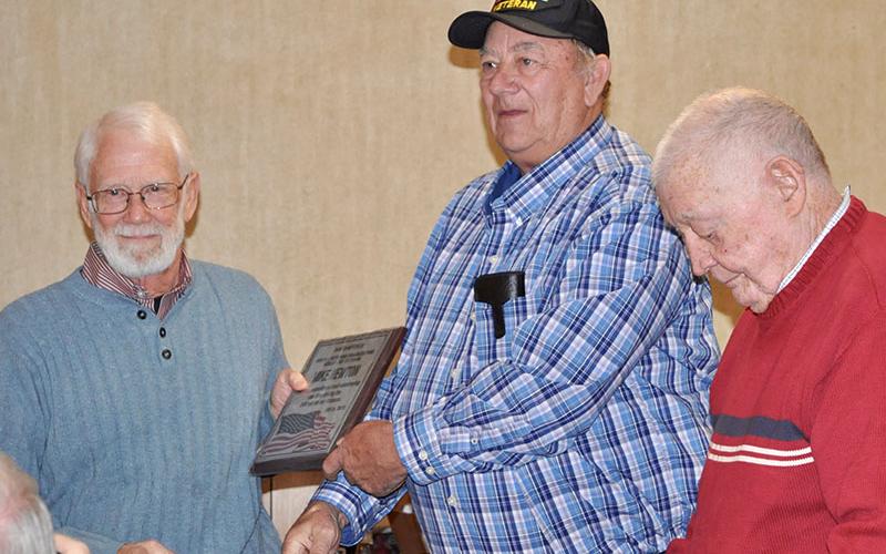 The Fannin County veterans organizations honored Mike Newton, left, and thanked him for driving community veterans to the VA hospital in the Disabled American Veterans van. He is shown with Paul Hunter, middle, and Joe Brandon.