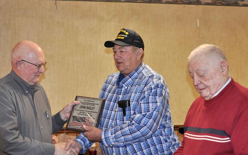 John Bailey was one of eight to be recognized at the Fannin County veterans organizations’ Christmas dinner Thursday, December 5 for volunteering to drive community veterans in the Disabled American Veterans van. He is shown with Paul Hunter, right.