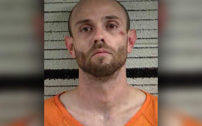 Danny Lee Davis is shown in a previous booking photo.