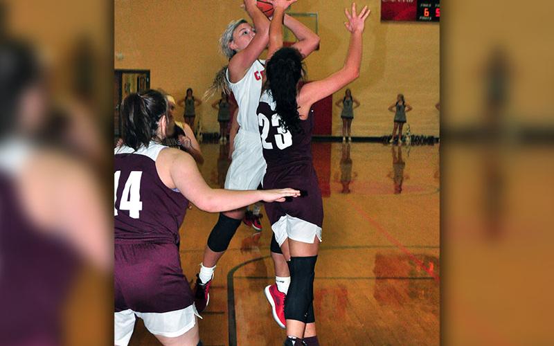 Lady Cougar Sapporiah Ross goes up against a defender in Copper Basin’s district game against Tellico Plains Tuesday, January 7.