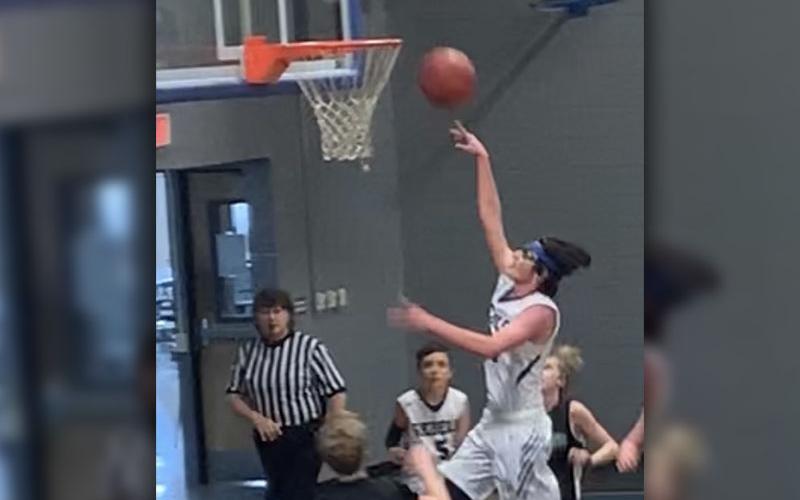 Fannin County Middle School Rebel Colton Gray goes in for a layup in the Rebels matchup with Pickens County.