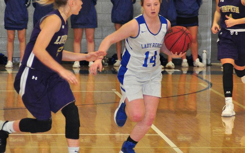 FCMS eighth grader Brooklyn Henderson leads a Lady Rebels fast break during the Fannin County Middle School’s home game against Lumpkin County Thursday, January 16.