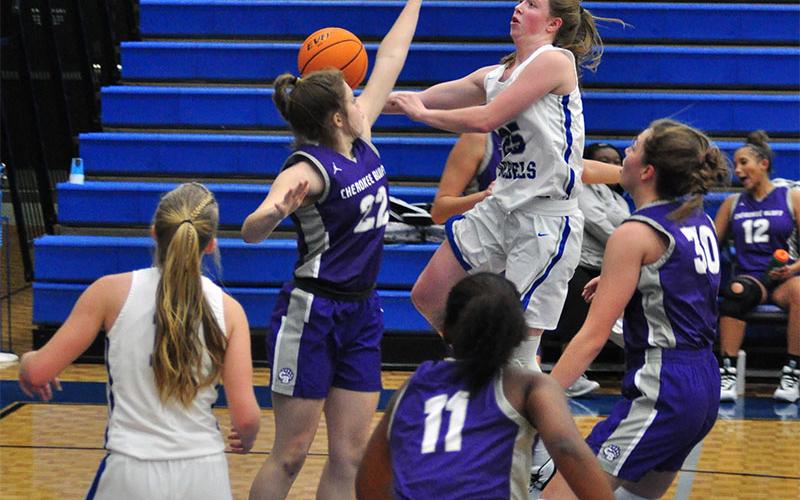 Lady Rebel Morgan Holt goes up for a contested layup in recent action for the Fannin County Lady Rebels basketball team.