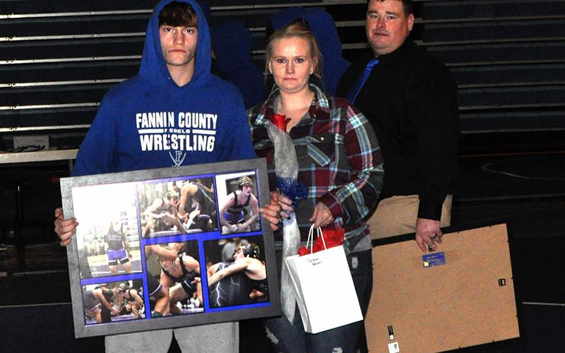 The Fannin County Rebels wrestling team celebrated eight seniors before their match with Union County Tuesday, January 21. Wrestling senior Dakota Adams was escorted by Melissa Anderson.