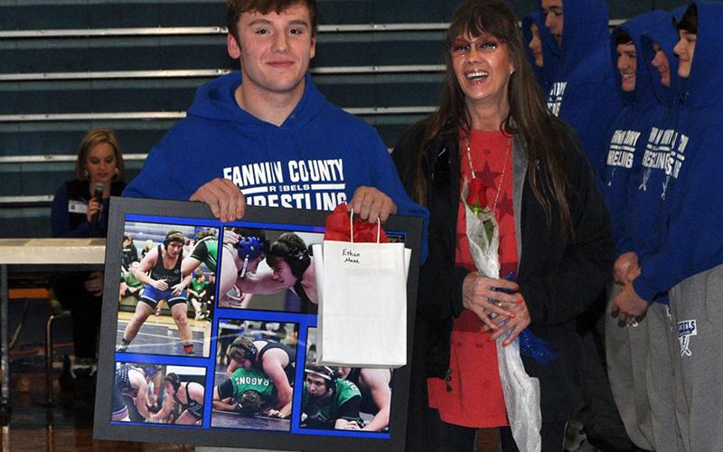 Fannin senior wrestler Ethan Mann was escorted by his mother Susie Mann during senior night at the Union County wrestling match Tuesday, January 21.