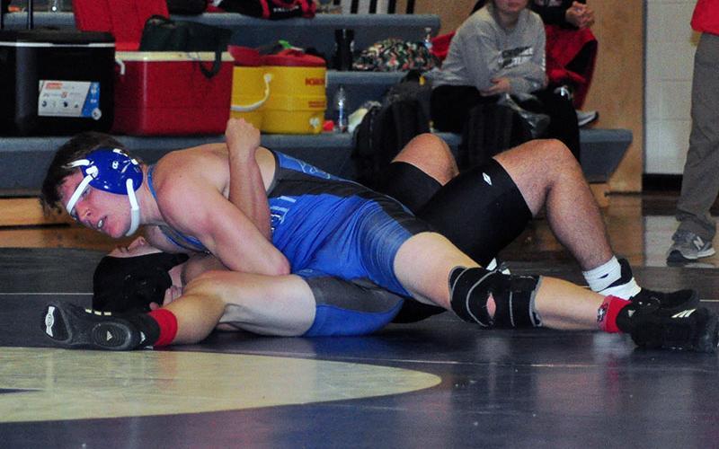 Fannin Rebel Thomas Mercer works to pin his opponent in recent action for the Fannin County wrestling team.