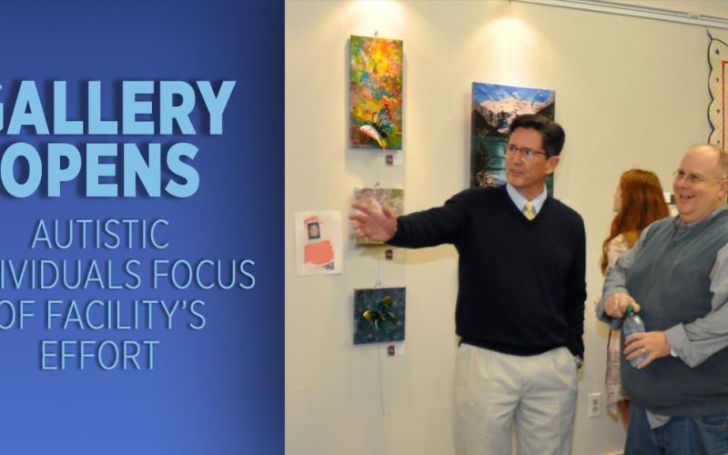North Georgia Autism Foundation Executive Director Tripp Ritchie and Byron Ahrens, pastor of Epworth United Methodist Church, talk art during the foundation’s grand opening of the NGAF Art Gallery.