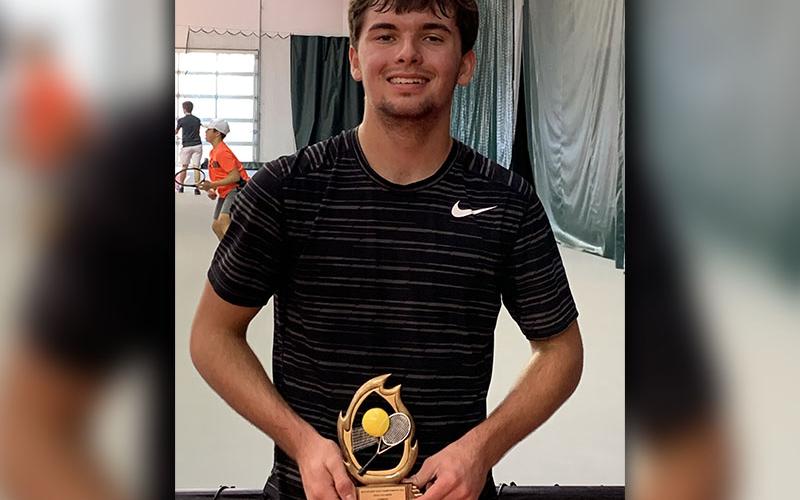 Jacob Gailey shows off his trophy he received for winninga USTA juniors tennis tournament in Chattanooga, Tennessee, January 18-19.