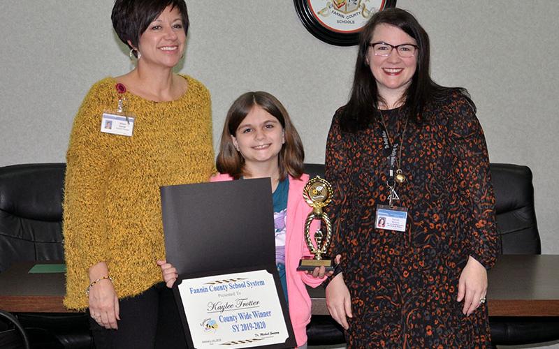 West Fannin Elementary student Kaylee Trotter won the Fannin County Spelling Bee Friday, January 10. The winning word was “beatboxing.” Trotter is shown along side Principal Alison Danner and Fannin Director of Instructional Services and Policy Sarah Welch. Trotter advances to region competition at Georgia Highlands College February 22.