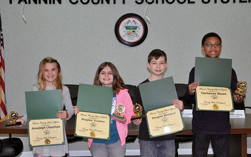 Spelling bee winners from each Fannin County school, excluding the high school, gathered for a county wide challenge Friday, January 10, at the Fannin County Board of Education office. Contestants are, from left, Annaleigh Cheatham of Blue Ridge Elementary, Kaylee Trotter of West Fannin Elementary, Deagan Kendall of East Fannin Elementary and Carnaceo Dixon of Fannin County Middle School.