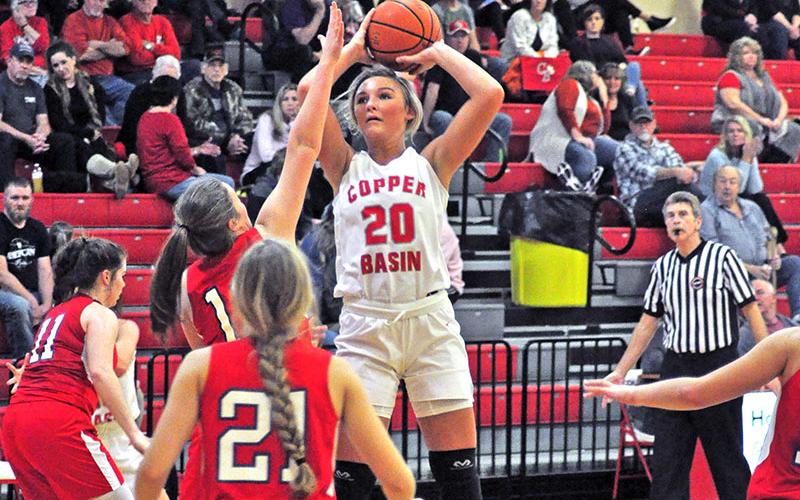 Lady Cougar Sapporiah Ross shoots a two-point jumper over a defender during Copper Basin’s basketball game against Polk County Tuesday, February 4.
