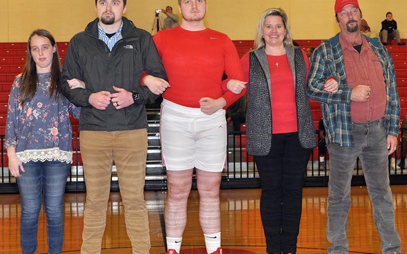 Copper Basin High School honored 11 seniors in between the Lady Cougars and Cougars basketball games Tuesday, February 18. Picture are, from left, Makayla Limburg, Tyler Limburg, senior Collin Limburg, Heather Russell, and Danny Russell.
