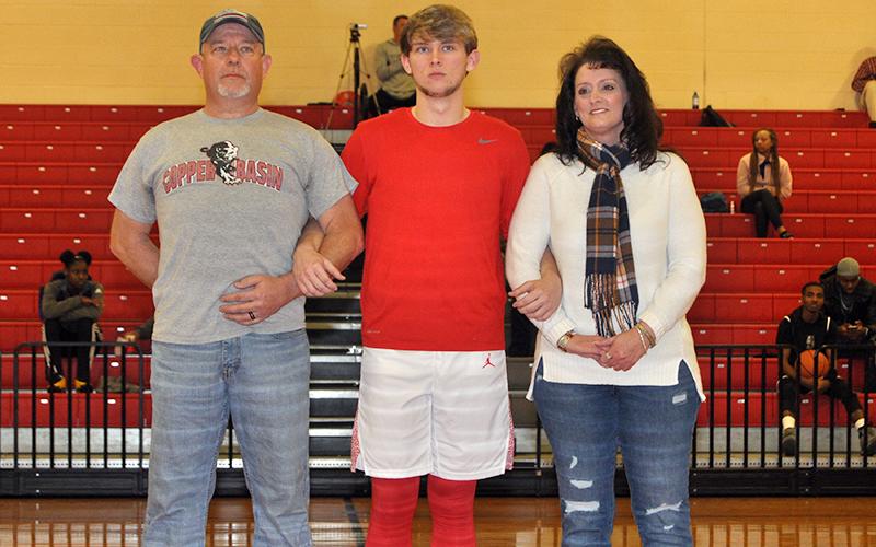 CBHS senior Nate Deal was honored at Copper Basin’s senior night Tuesday, February 18. Deal is shown with his parents Matt and Tricia Deal.