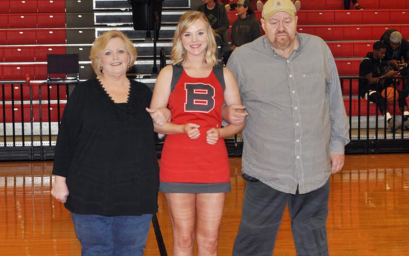 Copper Basin High School cheerleader Heaven Self was honored with 10 other seniors during senior night Tuesday, February 18. Self is shown with her parents Pat and Cindi Suits.