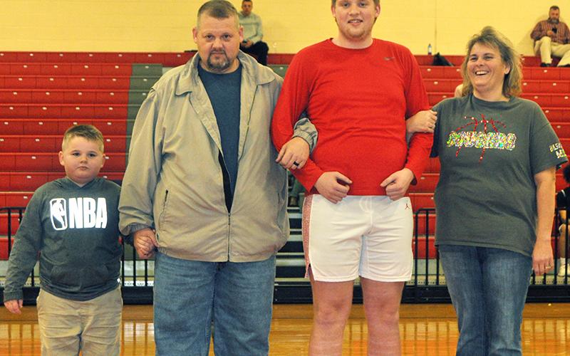 Eleven Copper Basin High School seniors were honored at Copper Basin’s senior night Tuesday, February 18. Pictured are, from left, Landon Tallent, brother; Greg Tallent, father; senior Logan Tallent and Leanne Tallent, mother.