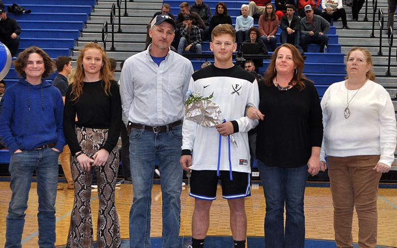 Eight Fannin County seniors were honored Friday, January 31, at Fannin County’s home basketball game against GAC. Shown are, from left, Wyatt Crawford, brother; Jayden Holloway, sister; Andy Crawford, step father; senior Jerritt Holloway, Carrie Crawford, mother; and Annette Wilson, grandmother.