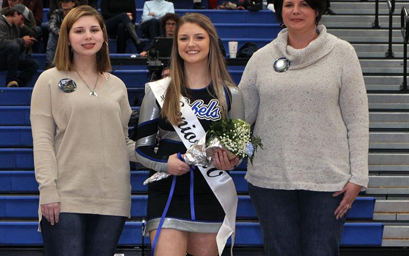 Senior Cheerleader Morgan Mull was celebrated during the senior night festivities at Fannin County’s last home basketball game of the season Friday, January 31. Shown are, from left, Madison Mull, sister; senior Morgan Mull and Betsy Mull, mother.
