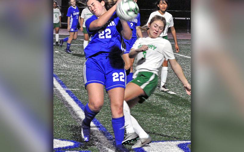 Fannin County Lady Rebel Rose Ballew (22) blocks a kick during the Lady Rebels victory against Murray County Tuesday, February 4.