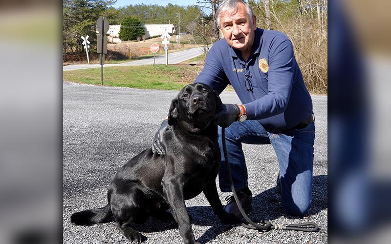 Animal Control Officer J.R. Cornett holds this male Black Lab who was found on Wise Road in Morganton Friday, February 21. He will be staying at Animal Control until reclaimed or adopted. This boy has a shiny, black coat with cocoa bean eyes and a lively personality. View him under Animal Control number 070-2020.