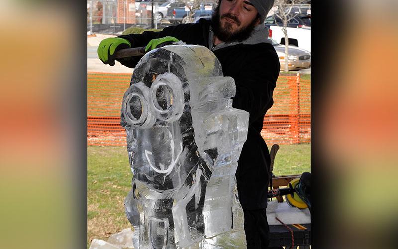 Rock on Ice sculptor Mike Banner chipped away at a block of ice, creating a “Despicable Me” minion, during Blue Ridge’s Fire &amp; Ice Chili Cook-Off and Craft Beer Festival Saturday.