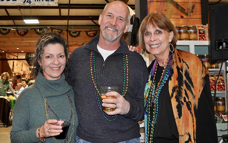 Snack in a Backpack saw hundreds of people travel to Mercier Orchards Saturday, February 22, for their annual Bringin’ the Blues to Blue Ridge event, where funds were raised to help the organization’s fight to decrease childhood hunger in Fannin County. Shown are, from left, Angene Campo, Paul Gerle and Lori Nez.