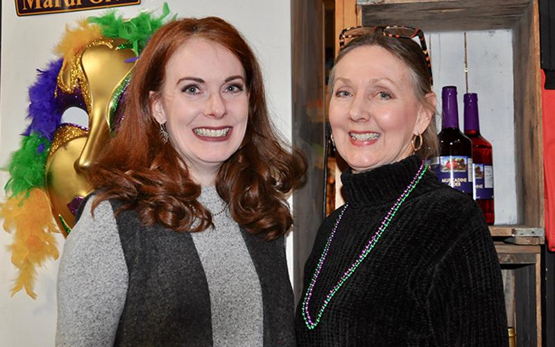 Diane Pruitt, left, and Paige Alford attended Snack in a Backpack’s annual Bringin’ the Blues to Blue Ridge fundraiser Saturday, February 22.