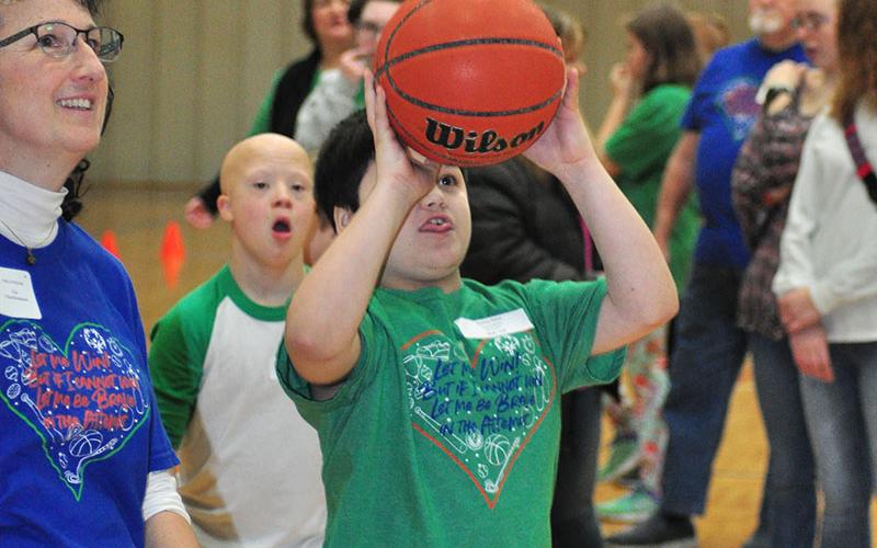 Special Olympics athlete Damian Hilton goes up for a bucket during the Fannin County Special Olympics basketball competition at the Fannin County Recreation Center Friday, January 31.