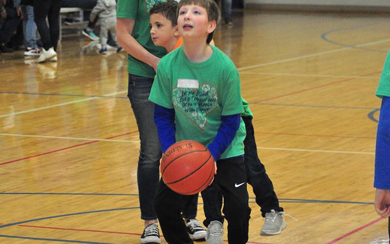 Special Olympics athlete Alex Hughes shoots a free throw during the Fannin County Special Olympics basketball competition Friday, January 31.