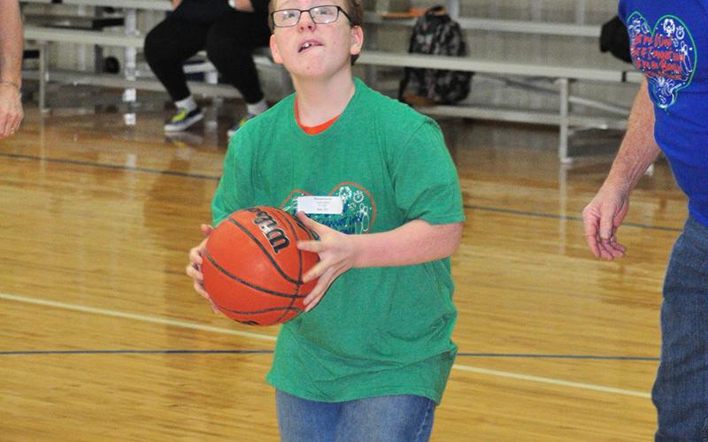 Braxton Graves sinks a jumpshot during the Fannin County Special Olympics basketball competition at the Fannin County Recreation Center Friday, January 31.