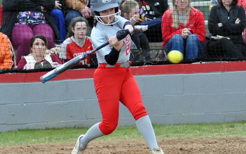 Lady Cougar Bailey Mundy unloads on a pitch in recent action for the Copper Basin Lady Cougars softball team.