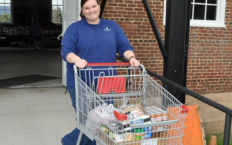 Volunteer Karen Hixon helped deliver groceries to Copper Basin area families at the Hoist House.