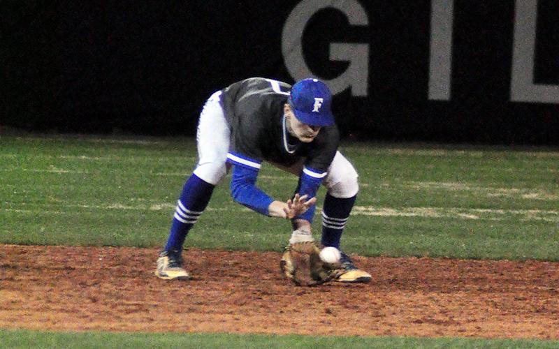 Fannin Rebel Matthew Shirah scoops a ground ball in recent action for the Rebels baseball team.