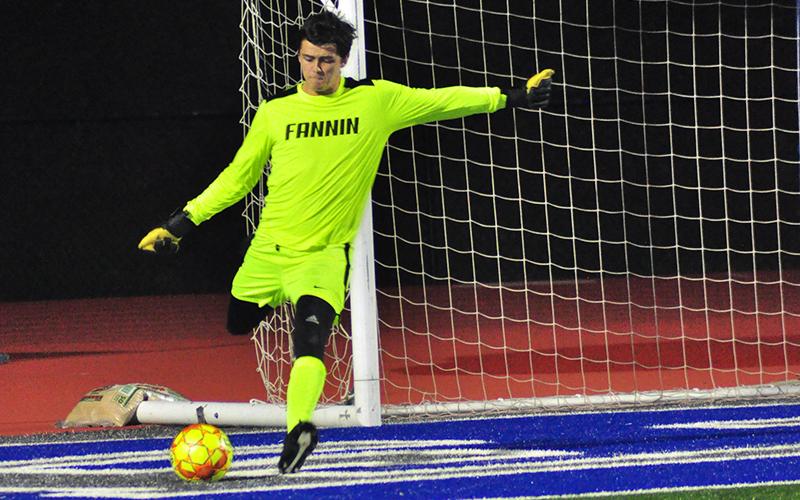 Fannin Rebel Chandler Bond boots the ball away from the Rebels goal in recent action for the Rebels soccer team.