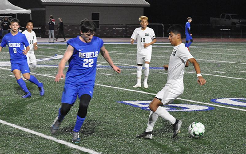 Fannin Rebel Garrett Mervine makes a play on the ball in recent action for the Fannin County Rebel soccer team.