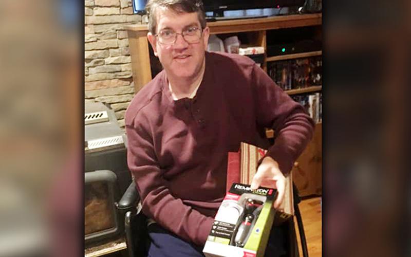 Jonathan Buller was all smiles this past Christmas when he was able to open his own Christmas presents.