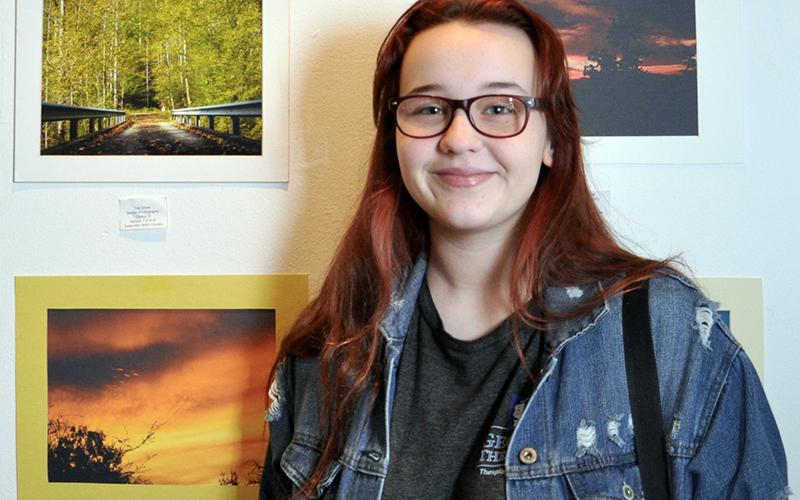 Lily Oliver, Fannin County High School student, has artwork on display at The Art Center in Blue Ridge. Her piece is the photograph at the top left.