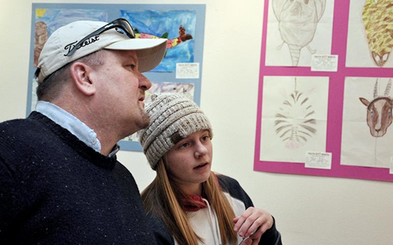 Jim and Annabeth Minear check out the young talent at Blue Ridge Mountains Arts Association’s Youth Art Month Opening Reception Thursday, February 27. The event featured artwork from Fannin County schools, Copper Basin schools and homeschool students in the area.