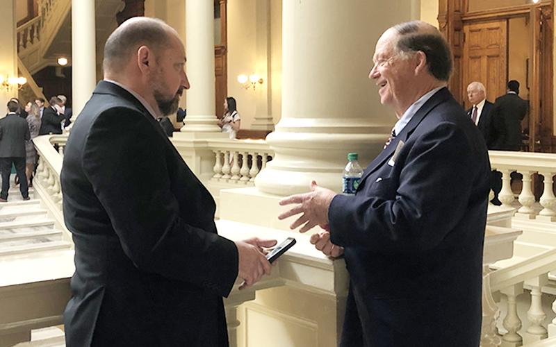 Fannin County Board of Education members Mike Cole, left, and Bobby Bearden learned more about legislation that could potentially affect Fannin County students, including Senate Bill 237, which would reduce the number of student assessments required by the state.