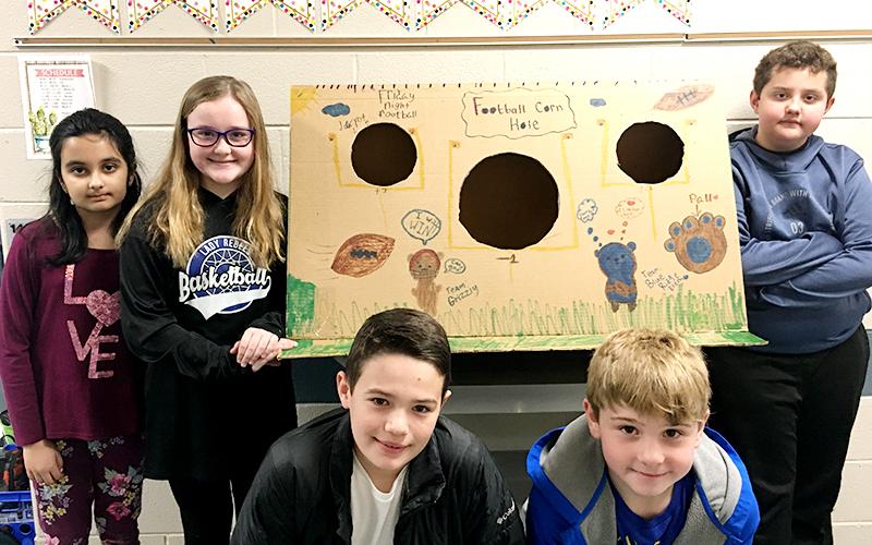 Blue Ridge Elementary School students created cardboard arcade games in small groups during their weekly STEAM classes and presented them during the school’s annual STEAM Night Tuesday, March 10. Shown are, from left, Khadija Usman, Jaelyn Breaux, Casen Bailey, Archer Twiggs and Gabriel Partin.