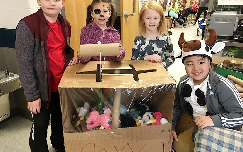 Blue Ridge Elementary School held their annual STEAM Night Tuesday, March 10, where students presented their cardboard arcade game creations after they researched, planned, designed, journaled and engineered them. Shown are, from left, Copen Daves, Molly Prince, Eva Raque and Farrell Roring.