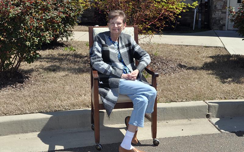 Phyllis Kaiser smiles as she waits for the parade to start at the Blue Ridge Assisted Living &amp; Memory Care Friday, April 3.