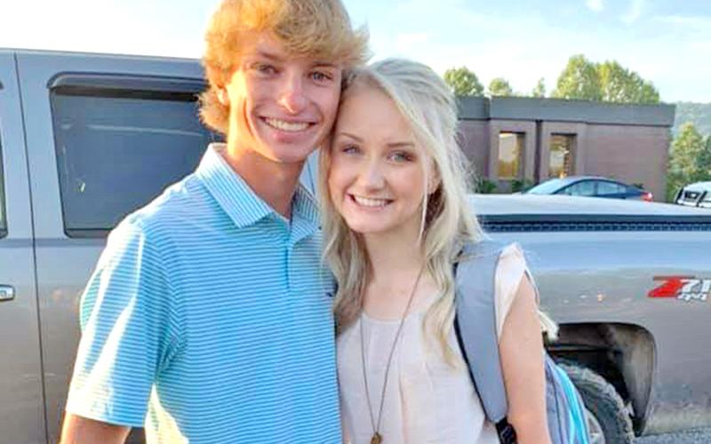 Fannin County High School sweethearts and seniors Grant Sullivan and Amber York stop for a photo in the school’s parking lot before heading to class on the first day of their senior year this past August.