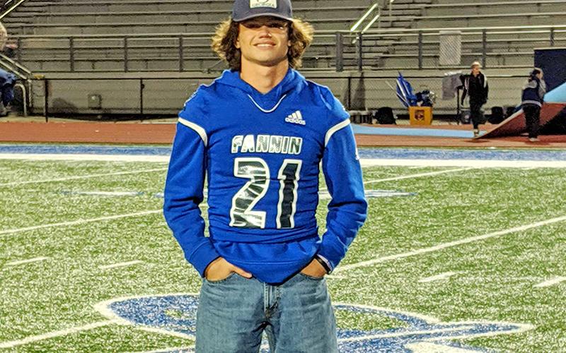 Sporting his football jersey, Fannin County High School senior Treylyn Owensby stands proud on the Rebels’ field.