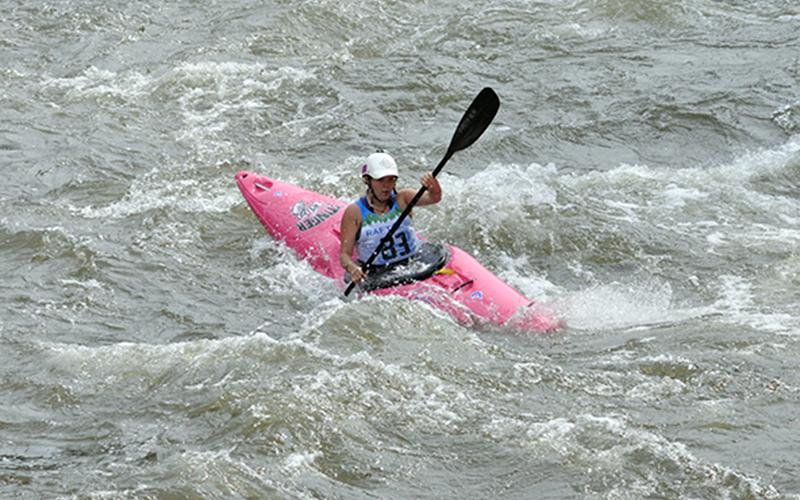 Olivia McGinnis fights the rapids at the Ocoee Whitewater Center on the Ocoee River.