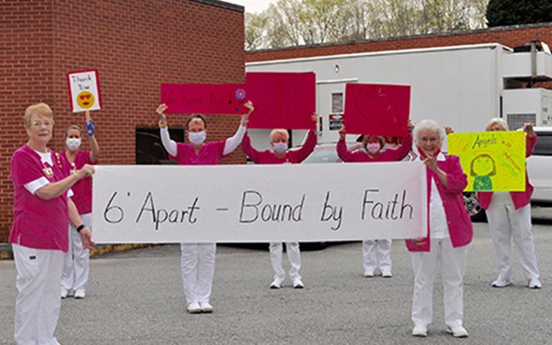 The Fannin Regional Hospital Auxiliary “pink ladies” held heartfelt and thankful signs for hospital employees to encourage them during the COVID-19 pandemic Tuesday, April 7. Among those holding signs were Janet Tishner, Barbara Cheatham, Carol Thomas, Jean Bonnewitz, Vicky Goddard, Brenda Higdon and Shirley Copeland.