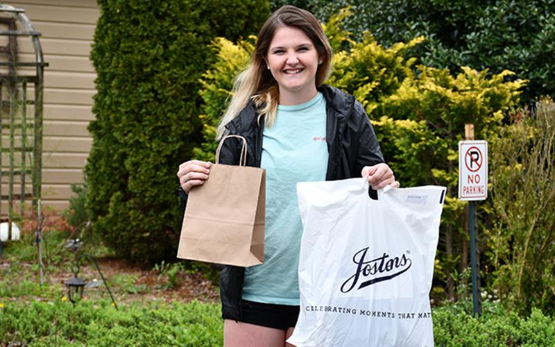 Fannin County High School senior Shelby Postell picked up her graduation gear and community-gifted gift cards and certificates from Cucina Rustica Friday, April 24.